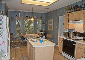 BEFORE: Original kitchen with 8 square foot island