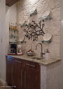 AFTER: New breakfast bar incorporates display of client’s vintage dinnerware